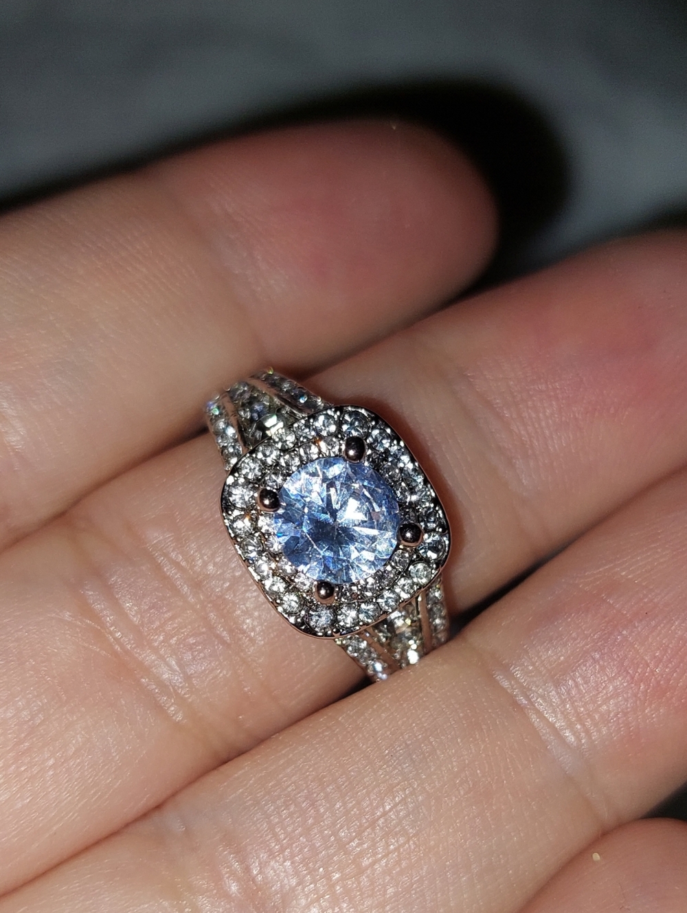 Silver Halo Ring with Light Blue Moissanite Center Stone